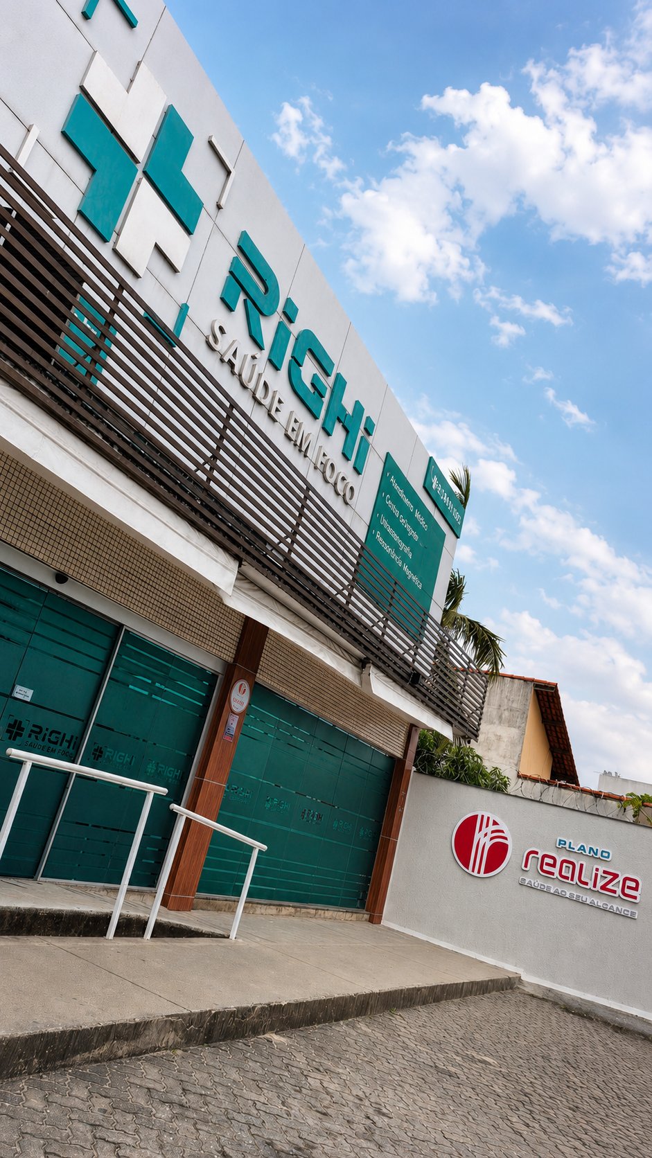 Fachada das Clínicas Righi em Iguaba Grande com a marca Plano Realize